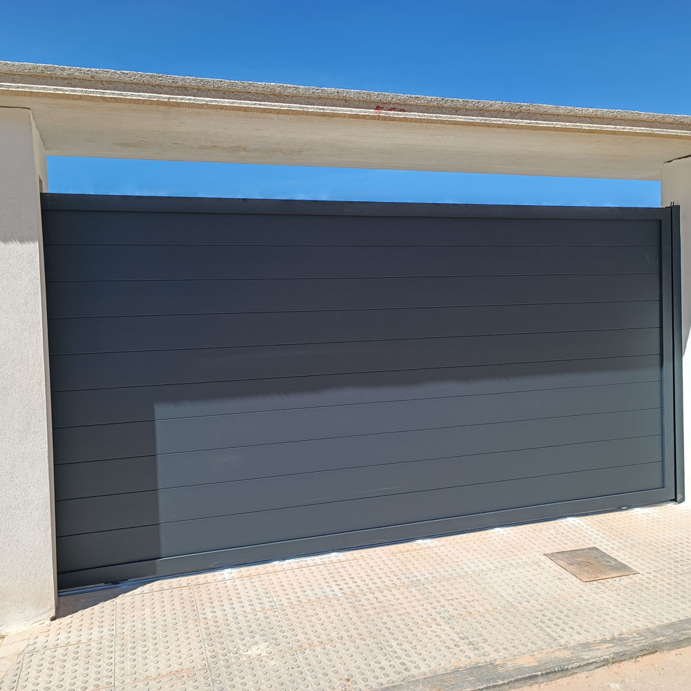 Puerta corredera de aluminio gris antracita para cochera